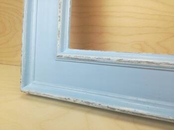 Lustro w niebieskiej ramie