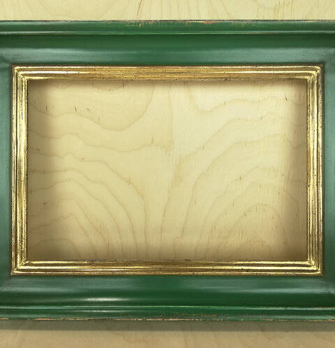 Lustro w zielonej ramie